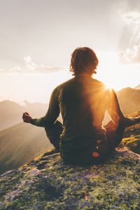 Man,Meditating,Yoga,At,Sunset,Mountains,Travel,Lifestyle,Relaxation,Emotional